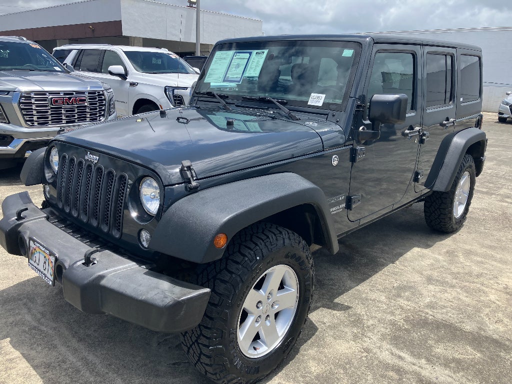 2017 Jeep Wrangler Sport in Rhino Clearcoat — front three-quarter view