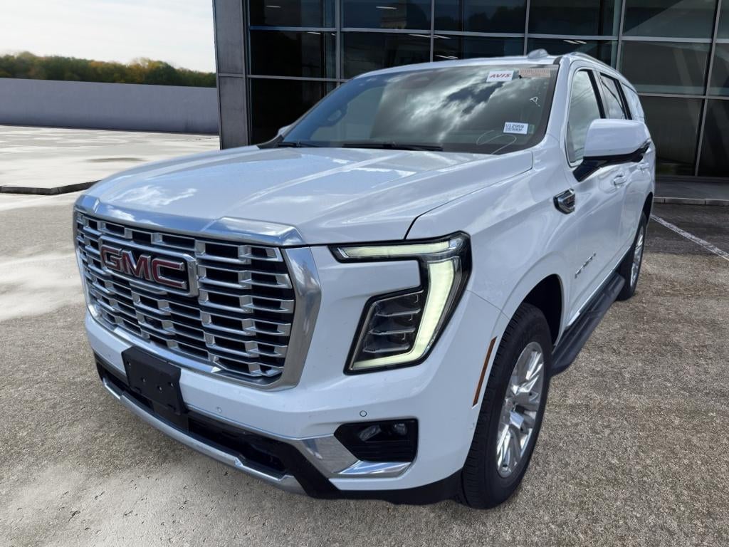 2025 GMC Yukon Denali in Summit White — front three-quarter view