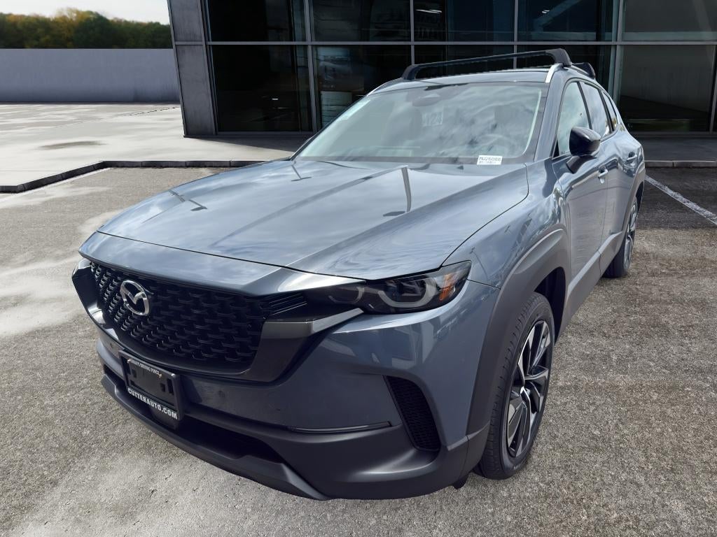 2026 Mazda Mazda CX-50 Hybrid Premium Plus AWD in Polymetal Gray Metallic — front three-quarter view