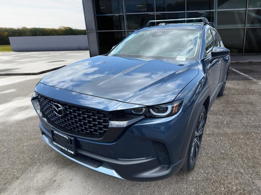 2026 Mazda Mazda CX-50 2.5 Turbo Premium Plus AWD in Ingot Blue Metallic — front three-quarter view