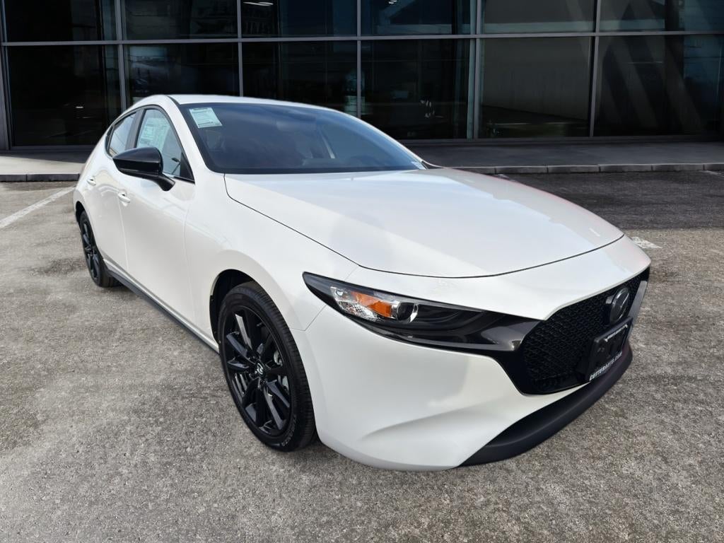 2026 Mazda Mazda3 Hatchback 2.5 S Carbon Edition AWD in Snowflake White Pearl — front three-quarter view